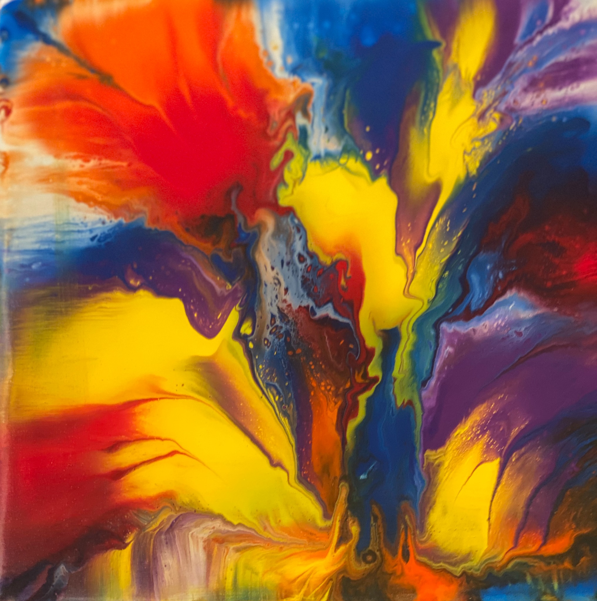 Bright fluid abstract artwork in yellow red blue and purple